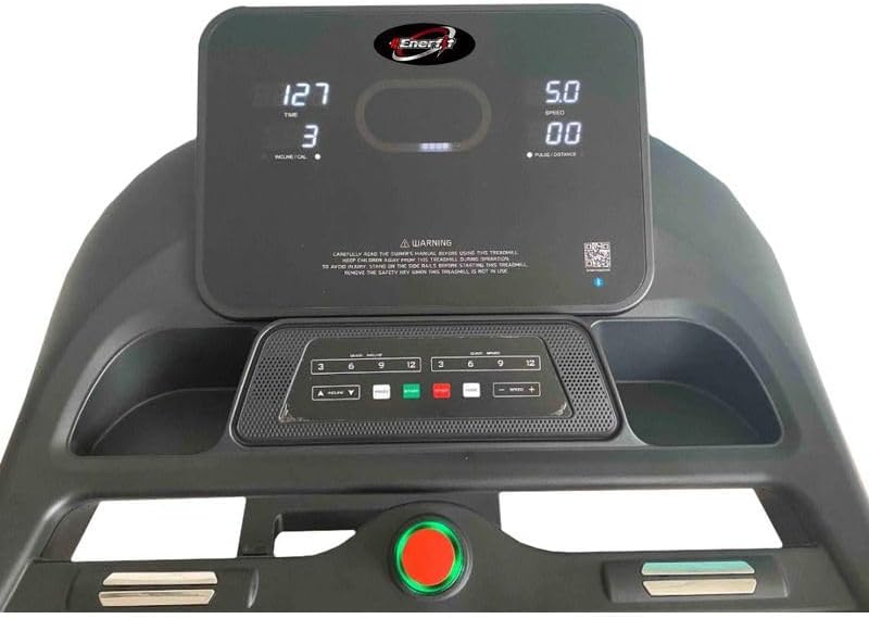 Close-up view of the TECNOFIT TF 5.80 treadmill console, showing the LCD display, control buttons for speed and incline, and the safety key slot.