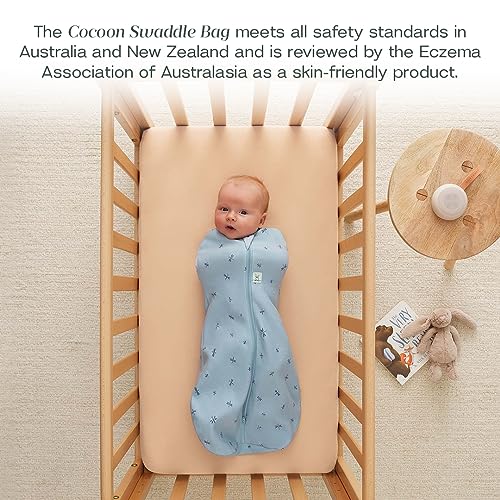 Image of ergoPouch Cocoon Swaddle Sack 1.0 TOG - Baby Sleep Sack, Gentle Snug Fit Helps Calm Startle Reflex, Ideal for Arms In /Out Sleeping, Soft Breathable Fabric for Better Sleep (6-12 Months, Dragonflies)