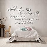 Wandschnörkel® WANDTATTOO *0308 Liebe ist.Schlafzimmer mit,Namen personalisiert Schlafzimmer (1,20m x 0.51m, Schwarz)