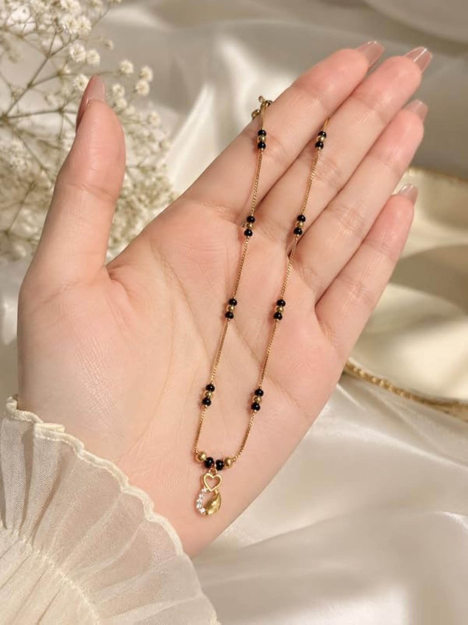 Women's Elegant Gold Heart Mangalsutra with Black Beads