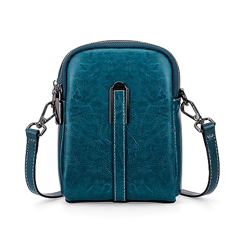 Double fermeture éclair pour ce petit sac bandoulière cuir rétro chic