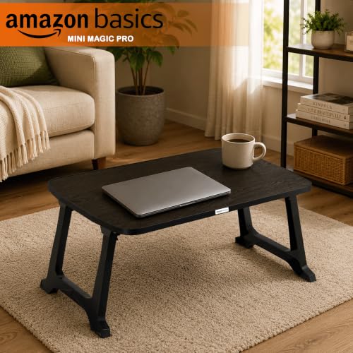 Image of Amazon Basics - CozyDesk Pro | Compact Foldable Lap Desk | Portable Bed Table for Laptop, Study, Meals | Engineered Wood Top with ABS Legs Table top 57 x 36, Height 28 cm