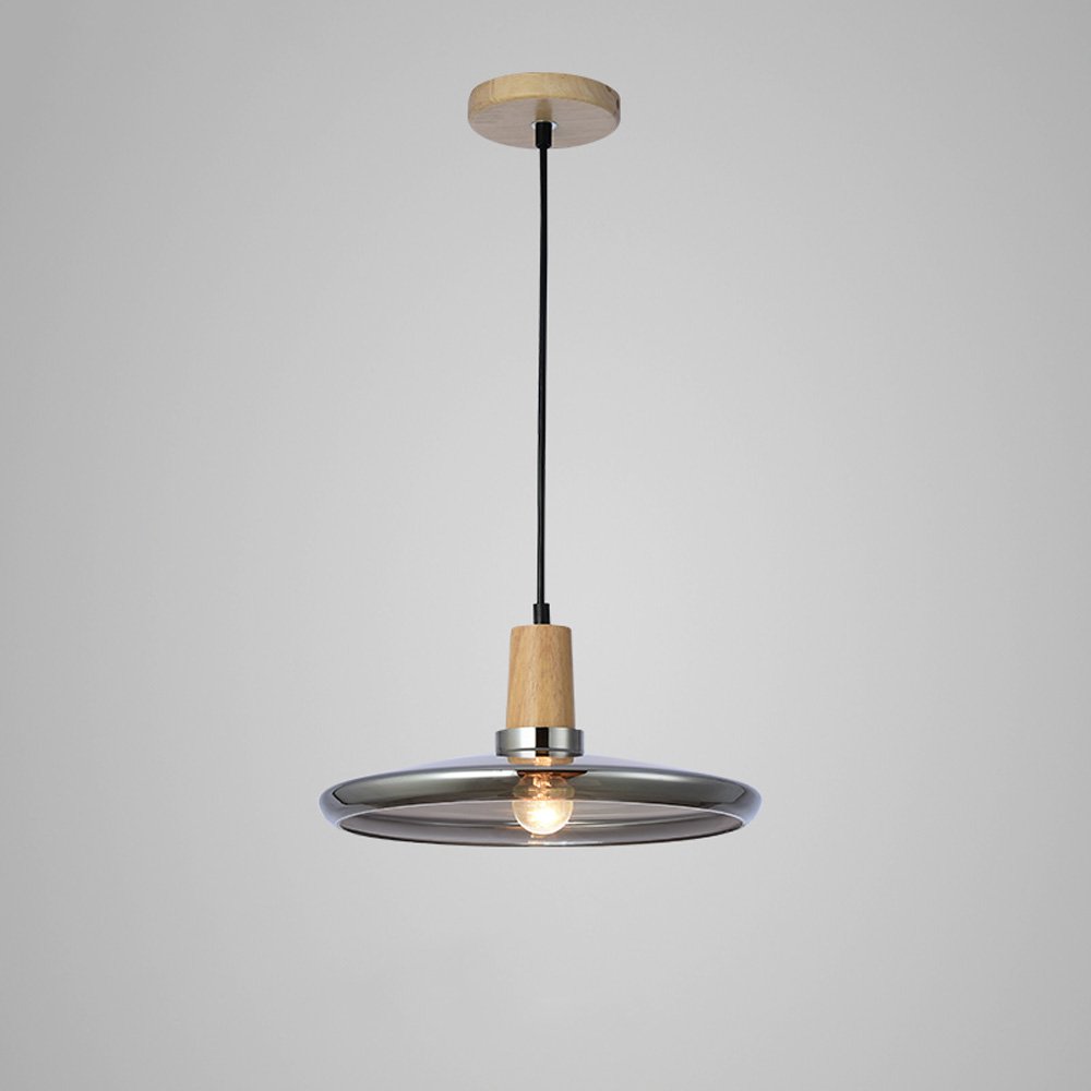 Lustre en verre suspendu au design artistique pour illuminer votre comptoir de bar