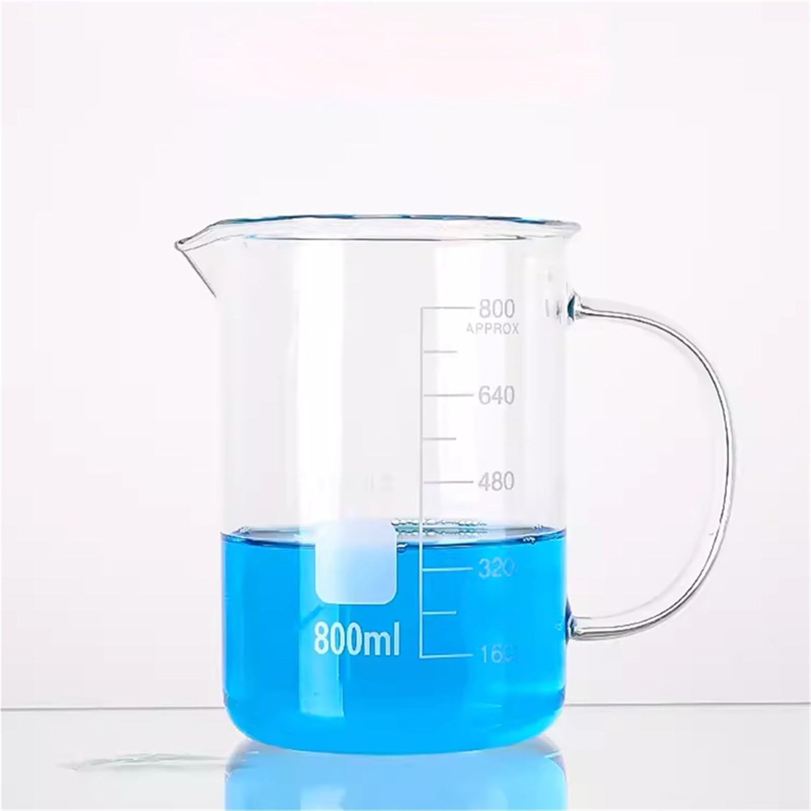 Vaso de precipitados de vidrio con asa y escala. Equipo experimental.(400ml)