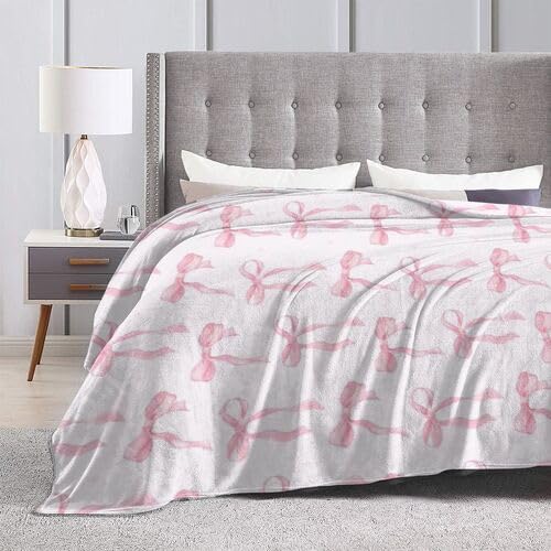 Couverture douillette en flanelle rose pour vos soirées canapé cosy