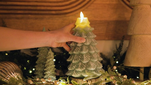 Image of Luminara Christmas Tree Flameless LED Candle, Green 4.7 inch x 6.5 inch, Moving Flame Battery Operated Timer, Holiday Decor, Glitter Snow Finish Safe