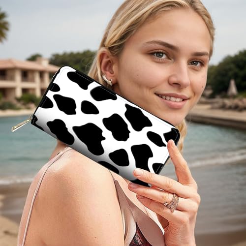 Image of RFID Blocking Leather Wallet for Women - Large Capacity Zip Around Clutch with 8 Card Slots,33 Cash Pockets & Coin Zipper,Cow Print