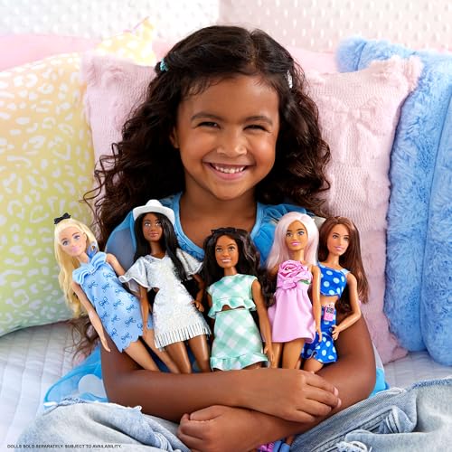 Image of Barbie Fashionistas Doll #237 with Wavy Blonde Ponytail Wearing Blue Bow Halter Dress, Black Hair Bow Accessory and Matching Blue Heels | Blue Bow Halter Dress, Black Hair Bow Accessory, Matching Blue Heels