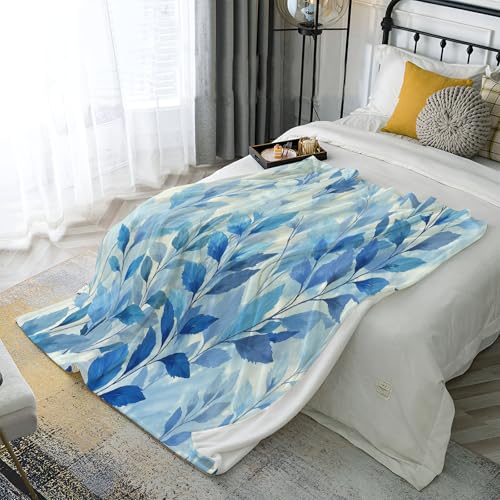Couverture feuilles bleues chaude et douce contre les nuits fraîches