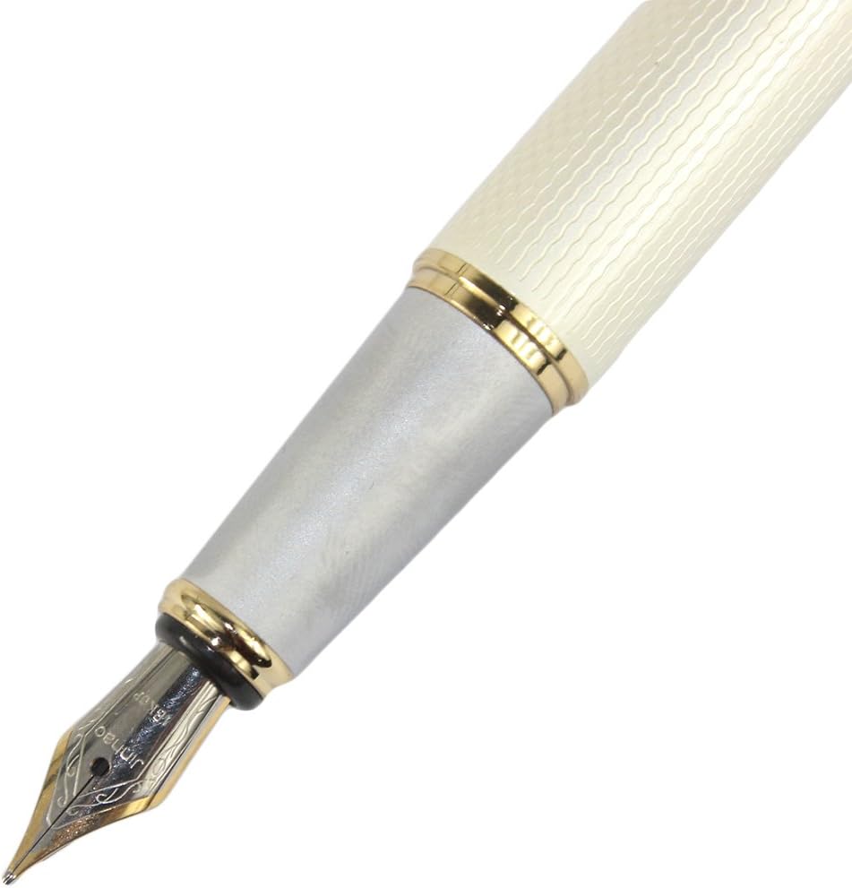 Close-up of the pen's nib and grip section, showing the fine point and the transition from the white barrel to the silver grip.