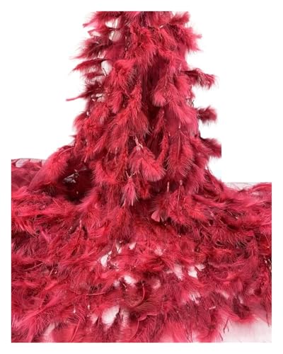 Dentelle moelleuse et plumes pour rayonner lors de votre mariage franco-nigérian