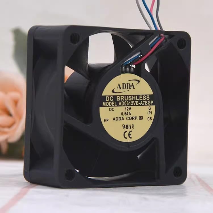 Another angled view of the REAMTONY 6025 cooling fan, showing the fan blades and the ADDA label from a different perspective.