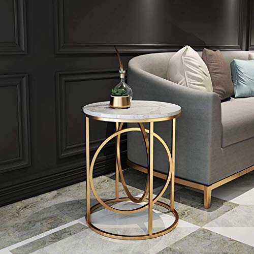 Table basse ronde dorée pour optimiser les petits espaces de nuit - 8