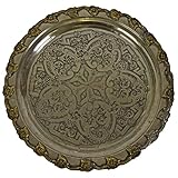 Les décorations élégantes et la brillance argentée donnent à la feuille de thé une touche typiquement orientale.
