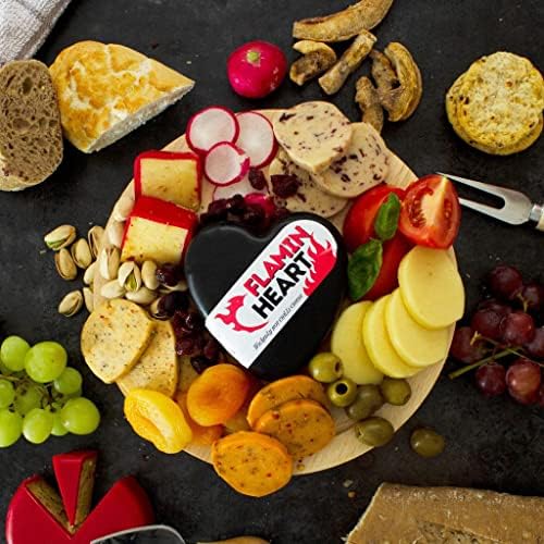 Flamin Heart Chilli Cheese 200g. A Delicious Cheddar Cheese With A Chilli Kick, Sealed In Heart Shaped Black Wax. The Perfect Valentines Cheese Gift. The Chuckling Cheese Company.