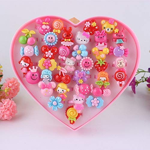 FAVELA Kids Girls Cartoon Pretend Play Toy Fancy 36 finger rings for birthday gifts comes in pink heart shape box .Suitable for age 2 -10 yrs.