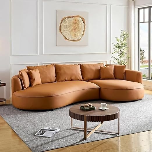 Image of Modern Curved White Sofa Couch with Plush Pillows - 4 Seater Upholstered Living Room Sofa | Contemporary Minimalist Design for Home, Office & Lounge. (Orange RHS.)