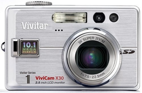 Vivitar VIVICAM-X30 camera back view with 2.5 inch LCD monitor displaying a landscape scene.