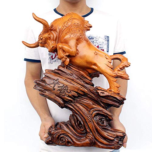 Sculpture en acajou d'une vache porte-bonheur pour décoration de bureau