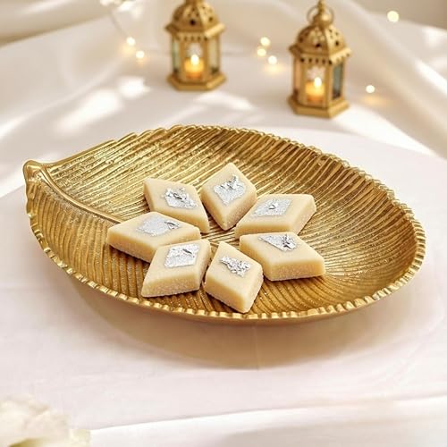 Image of BEHOMA Metal Leaf Shape Tray for Home Decor, Medium, Golden | Golden leaf-shape metal tray, medium size; perfect for mandap, haldi, mehendi & Navratri decor.