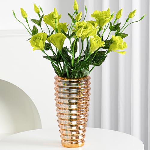 Dimensioni e confezione: altezza 23 cm, diametro inferiore 8 cm e diametro superiore 12 cm. 3 Colori Disponibili: Trasparente, Ambra, Grigio La confezione contiene solo un vaso, i fiori non sono inclusi.