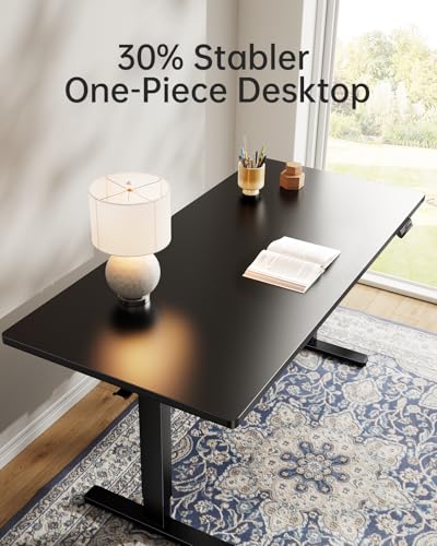 Image of HUANUO Electric Standing Desk, Whole Piece Desktop, Adjustable Height Computer Desk, 4 Height Memory Settings, Sit Stand Up Desk for Home Office, 55 inch x 27 inch, Black