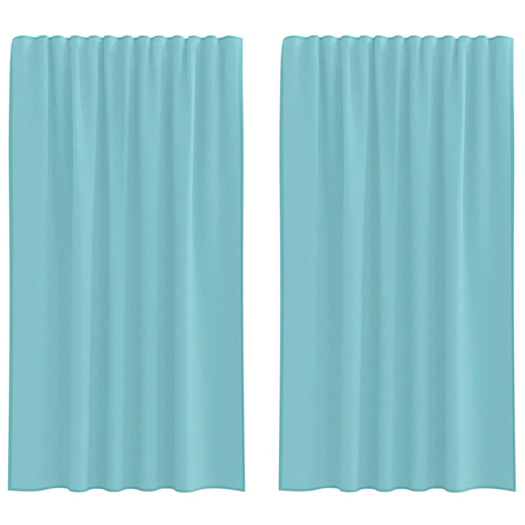 Rideaux transparents turquoise pour bloquer le vis-à-vis du salon sans assombrir