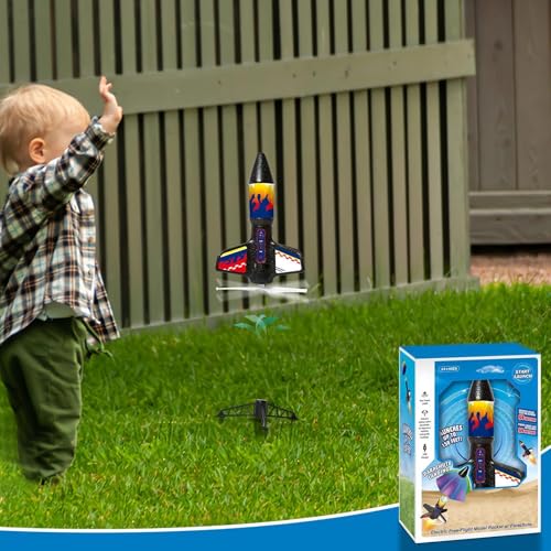 Activité de groupe interactive parent-enfant avec jouet fusée extérieur