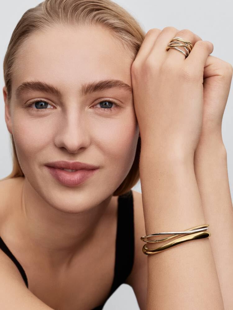 Sterling silver and 14k gold-plated open bangle