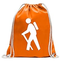 Randonneur Avec Un Sac à Dos Debout Au Bord D'une Falaise Et Regardant