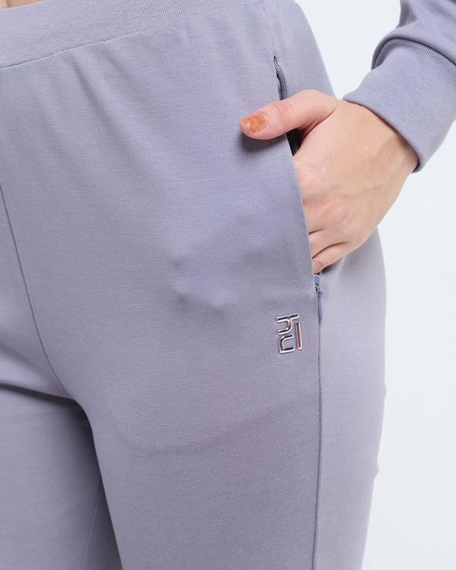 Image of HUNNIT Essential Flare Pants for Women with Zip Pockets | Mid Waist Solid Cotton Tapered Flare Pants | Bootcut Flared Trousers with Wide Elastic Waistband | Relaxed Fit Flared Trouser