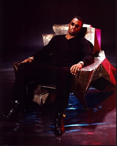 Posterazzi P Diddy In Silver Metal Chair Photo Print (16 x 20) - Articulo # MVM02434