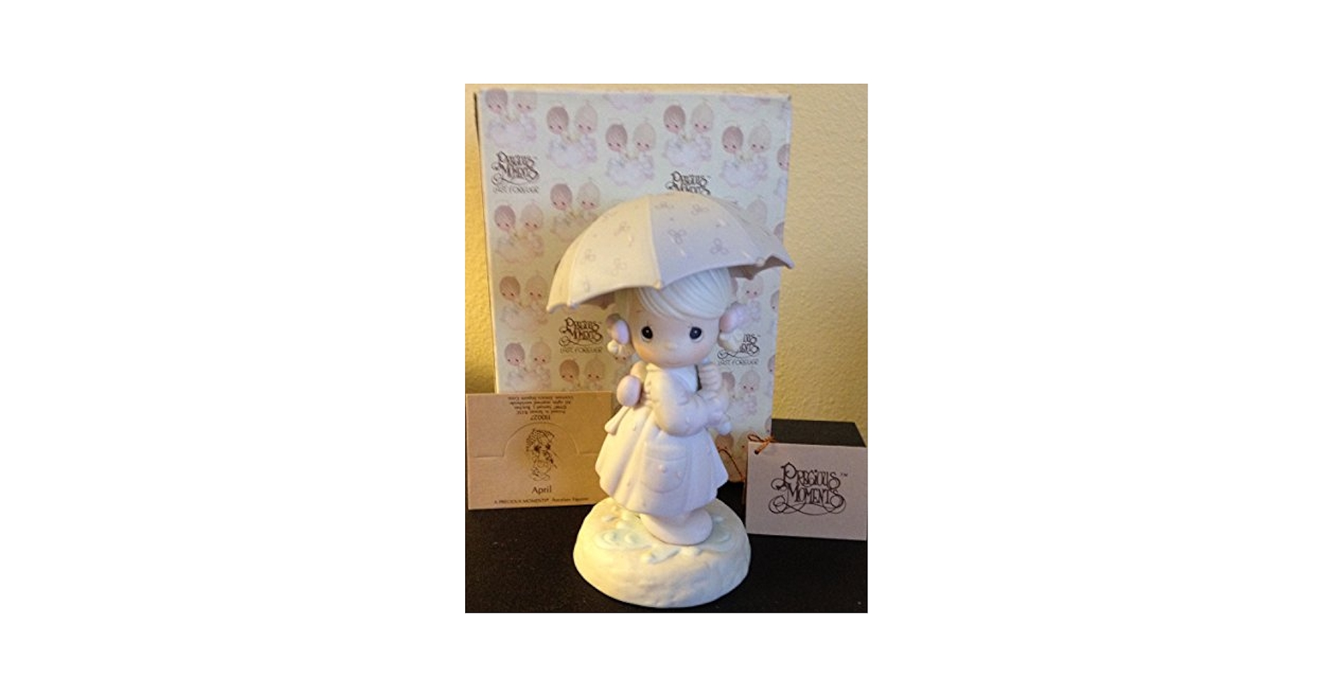Amazon.com: Precious Moments Figurine - April #110027 : Home