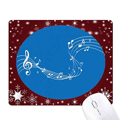 Tapis de souris bleu sur le bureau en hiver au design flocon