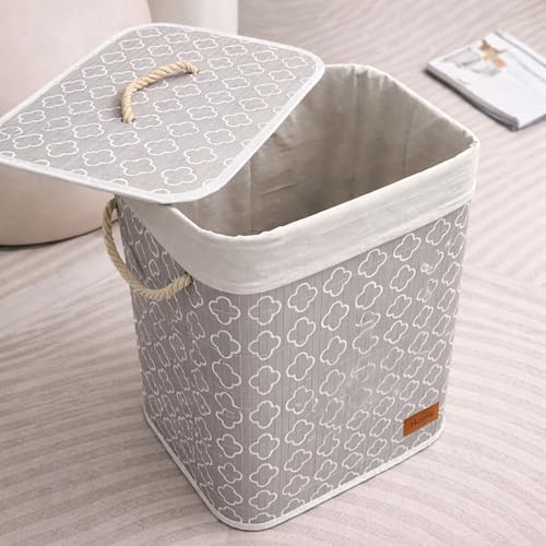 Image of Amazon Brand - Umi Rectangle Bamboo Laundry Basket for Clothes with Lid Quatrefoil Printed Hamper | Eco-Friendly, Foldable & Lightweight Organizer (Cream, 40x30x50 cm, Pack of 1)