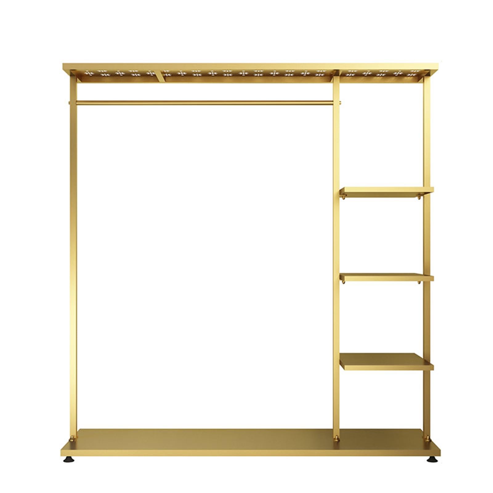 Portant à vêtements doré haut de gamme avec étagère chic pour boutique et dressing moderne