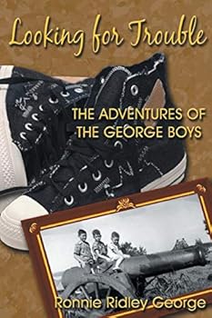 Paperback Looking for Trouble: The Adventures of the George Boys Book