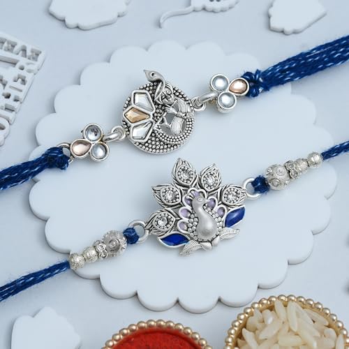Image of eCraftIndia Beautiful Peacock Lord Krishna Playing Flute Designer Rakhi Set of 2 | Rakhi for Brother Bhaiya Bhai with Best Bro Ever Fridge Magnet | Roli Chawal Pack