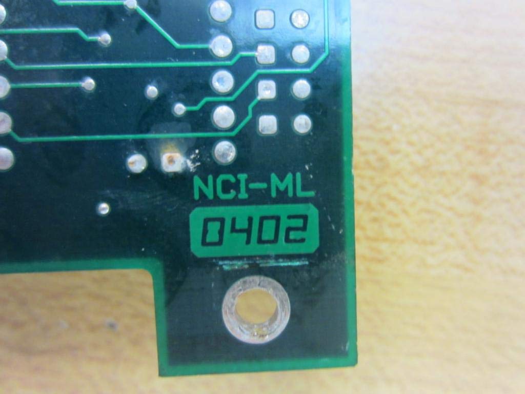 Close-up of NCI-ML 0402 marking on circuit board