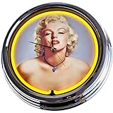 Orologio al neon appositamente realizzato con quadrante in metallo con vero vetro e anello cromato.