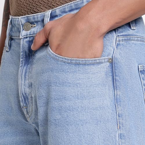 Image of GUESS Men Rodeo in Light Solid Relaxed Fit Denim Jeans