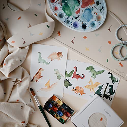 Image of mushie Silicone Baby Bib | Adjustable Fit Waterproof Bibs (Dinosaurs)
