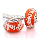 Wunderschön gearbeiteter, orangefarbener Murano Glas Bead verziert mit fluoriszierender Farbe. Dank dem eingearbeiteten Phosphor leuchtet dieser Bead in der Nacht - ein absolutes Highlight!