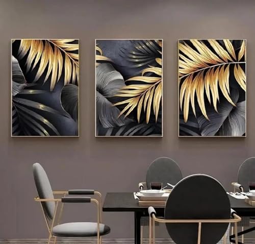 Impression de feuilles noires dorées sur toile pour un salon chic et moderne