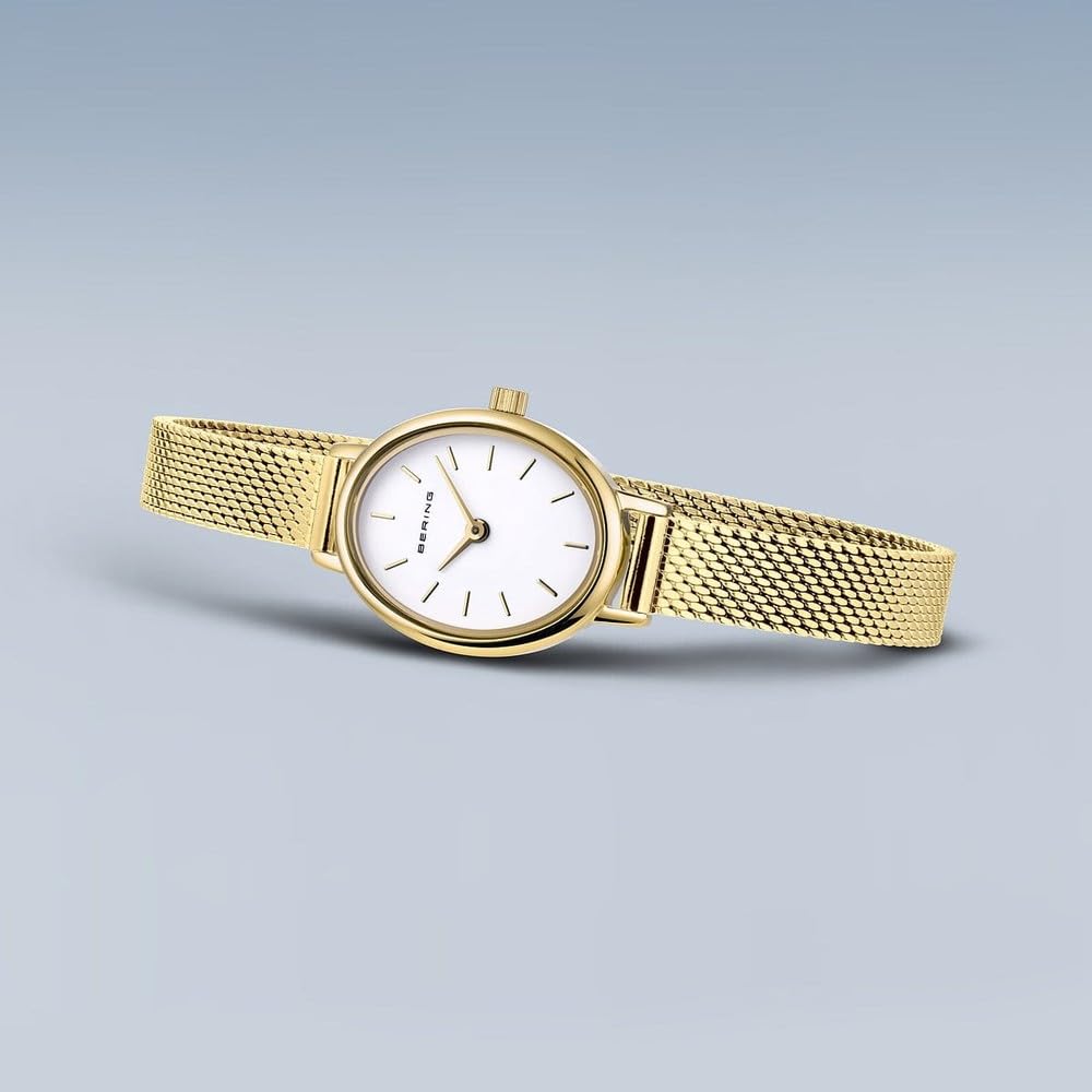 BERING Damen Quarz Uhr | Armbanduhr 20 mm goldenes Edelstahlgehäuse und weißes Zifferblatt | Milanaisearmband | Saphierglas | 3 ATM | 11020-334 | Saphirglas, Quarzwerk, Wasserdicht 3 ATM, Edelstahlgehäuse, Klappverschluss