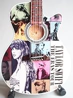 miniature guitar decorated with Taylor Swift's tour poster 2023 tour
