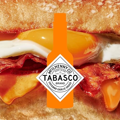 Image of TABASCO Brand Cayenne Garlic Pepper Sauce, Mild Hot Sauce, Glass Bottle, Smoky & Zesty Blend with Savory Garlic, Bold Flavor, Great for Italian Dishes & More, 2 Fl Oz (Pack of 1)