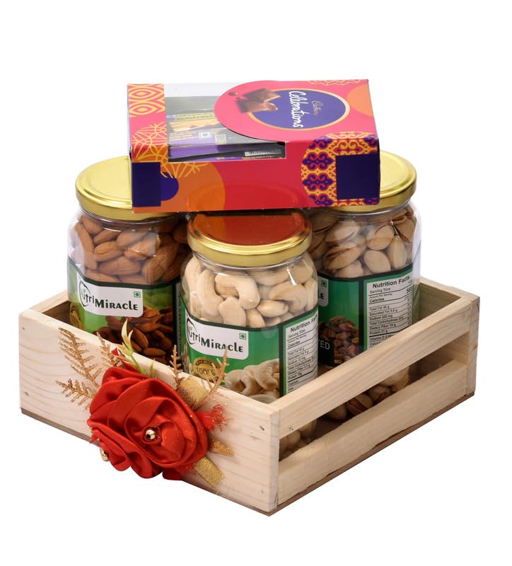 Image of NUTRI MIRACLE Diwali Dry Fruits Nuts Chocolates Gift Hamper Laddu Candles for Office Celebrations