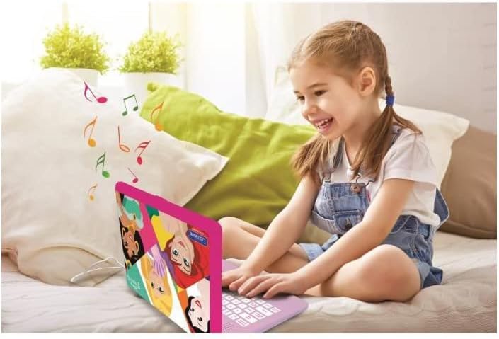 Girl smiling while using the LEXIBOOK Disney Princess Educational Laptop