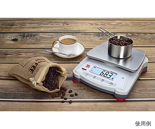 Ohaus NV422JP Compact Electronic Balance weighing coffee beans in a small pot, displaying '68.3 g'.